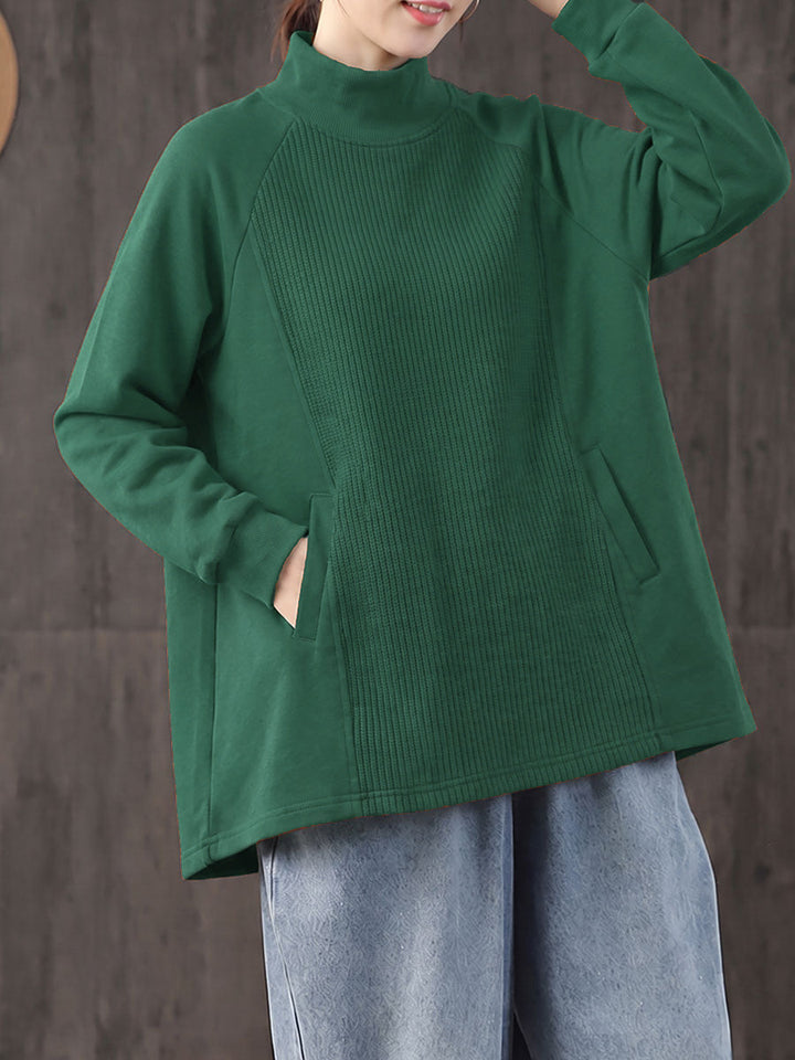 Safia – Oversize Bluse mit Rollkragen