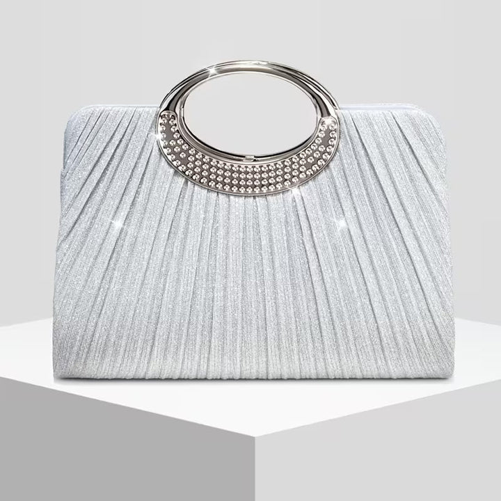 Lizzana – Glänzende, Runde, Plissierte Handtasche Mit Ringverschluss