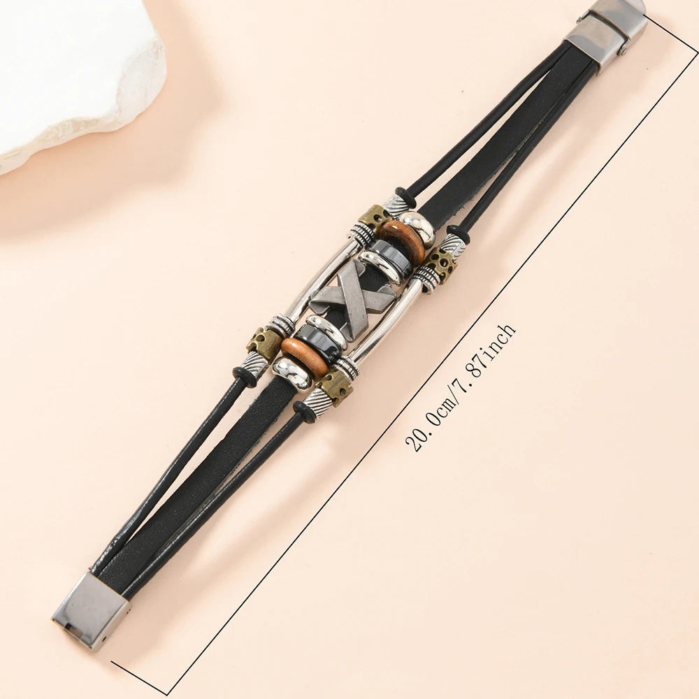 Garland – Mehrlagiges Lederarmband mit Kreuzmotiv