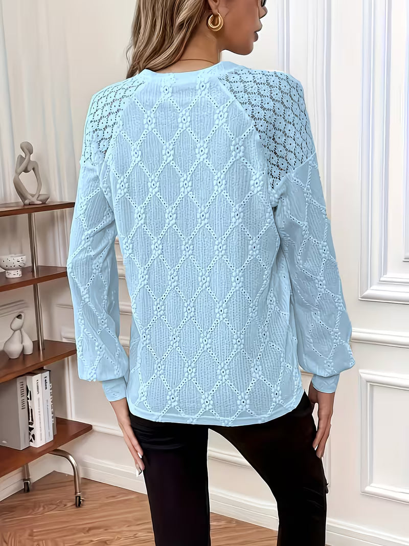 Meena – Grenzüberschreitende Bluse mit Rundhalsausschnitt