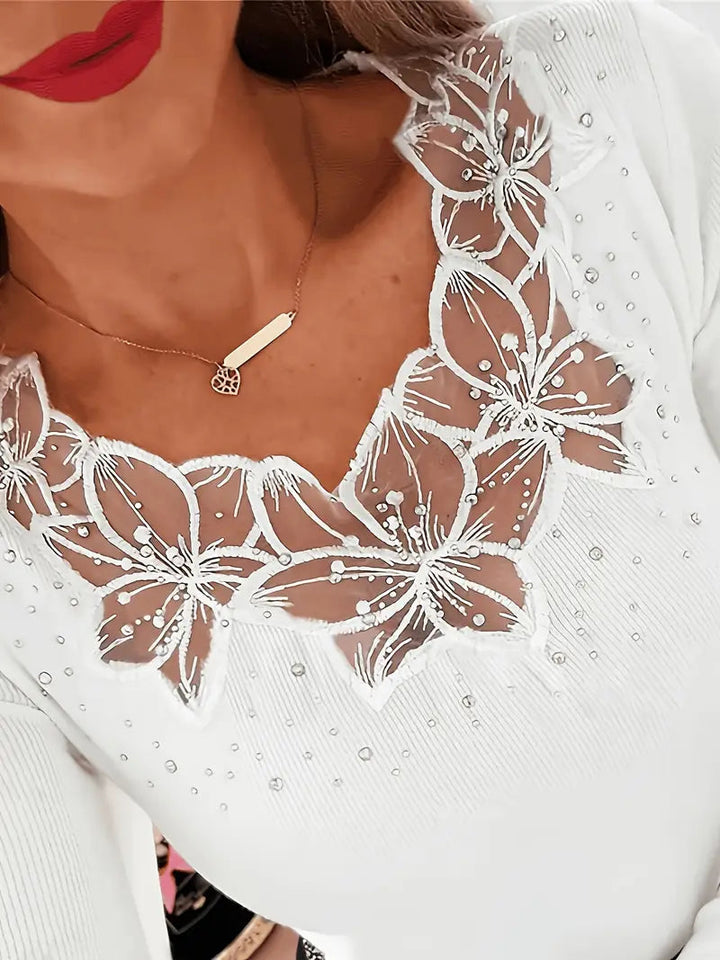 Nizara – Elegante Bluse mit V-Ausschnitt und Spitze