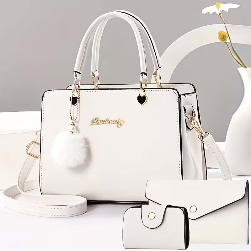 Sanika – Handtasche Mit Pompon Anhänger Und Schulterriemen