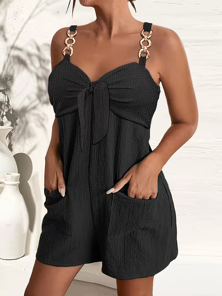 Loaiza – Ärmelloser Jumpsuit mit Kettenriemen