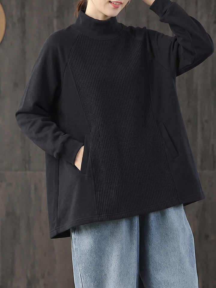 Safia – Oversize Bluse mit Rollkragen