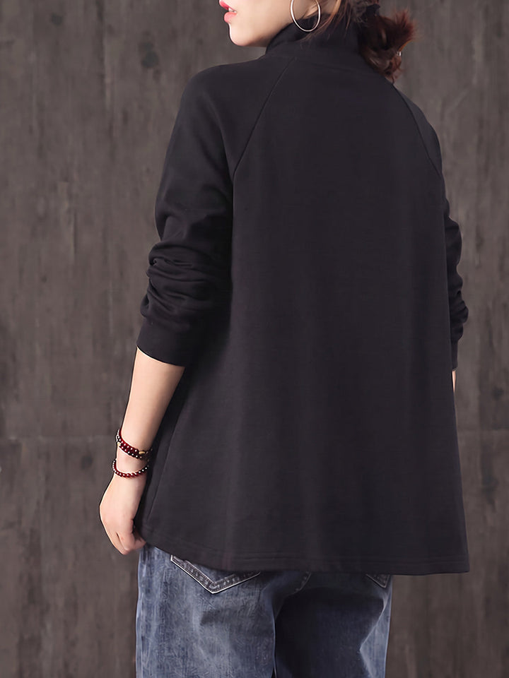 Safia – Oversize Bluse mit Rollkragen