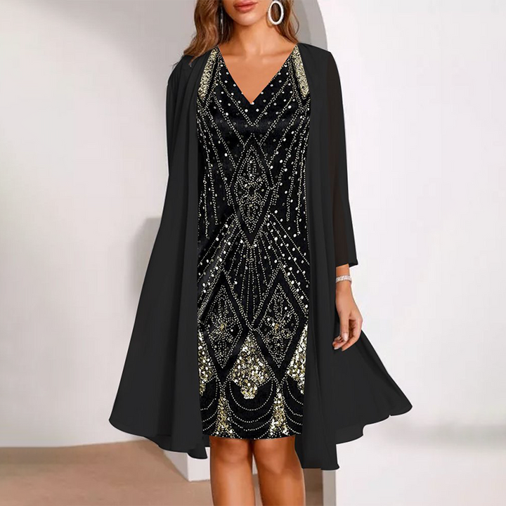 Kamla – Glitzerndes Kleid Mit V-Ausschnitt Und Transparentem Cape